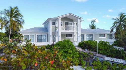 Deadmans Cay House | Tangerine Sunsets Long Island Santa Maria