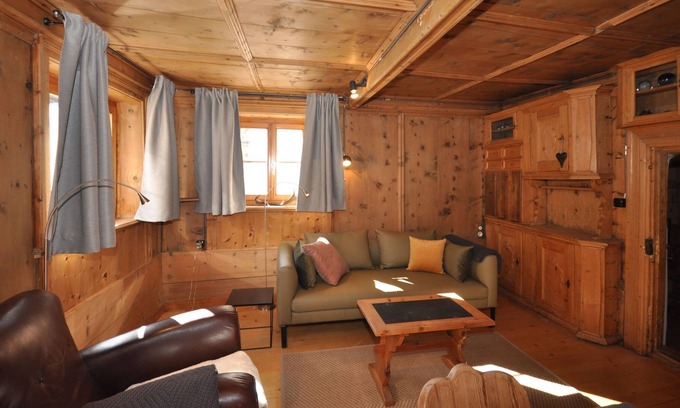 Engadin Scoul House | The 240 m2 authentic Engadine farmhouse from 1650 in the middle of i