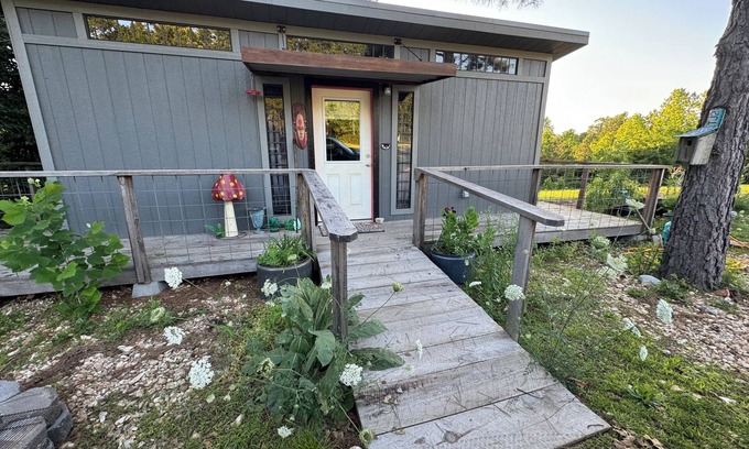 Pineville Cabin | The Adventure Center rustic tiny cabin hot tub access stage stars sunsets & pets