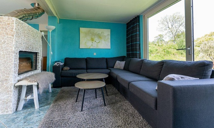 Ouddorp House | The attractively furnished bungalow with lots of light is situated on the child-friendly park De Klepperstee, close to the beach and the dunes in Ouddorp.