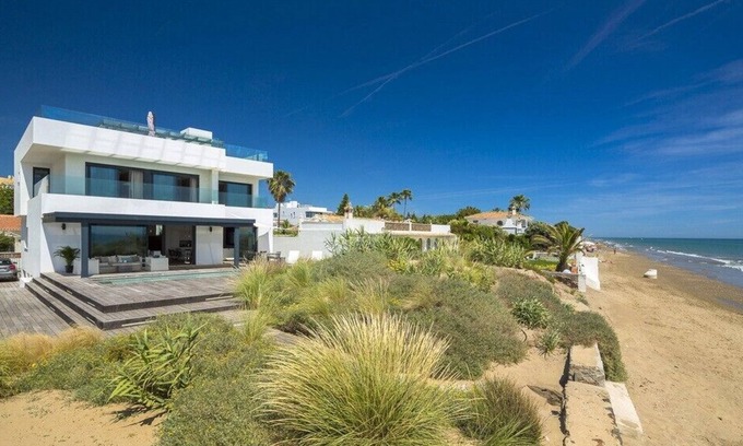Urbanizacion Costabella Villa | The Beach House -Front line beach Villa in Elviria