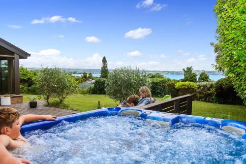 Kawaha Point House | The Bird House - Kawaha Point, Rotorua. Stylish six bedroom home with space, views and relaxed atmosphere