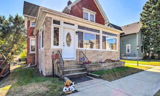 Michigan City House | 'The Cedar Porch' in Michigan City w/ Sunroom