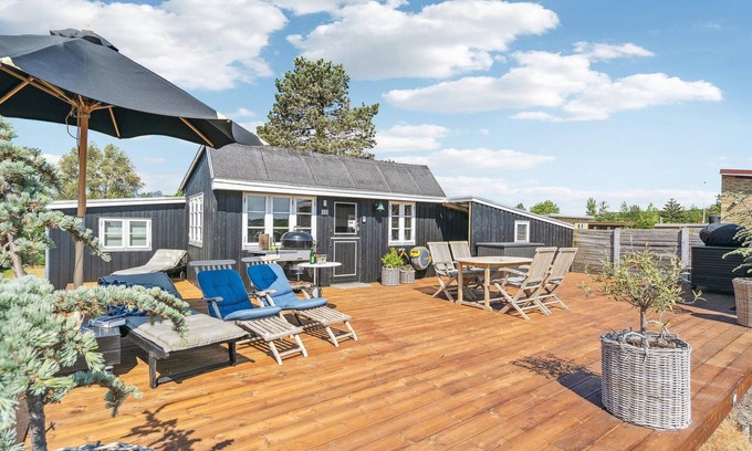 Broager House | The charming cottage offers you a fantastic view of the water.