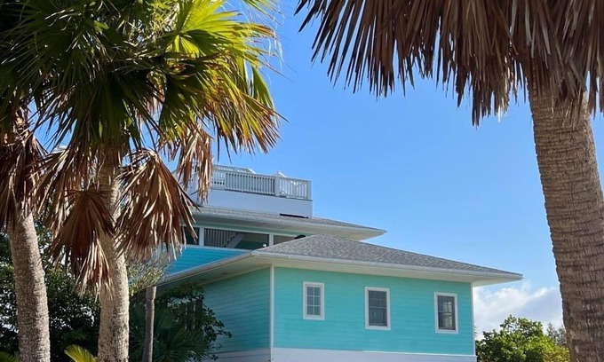 Green Turtle Cay Cottage | The Domino offers guests three levels of elevated, private and spacious living!