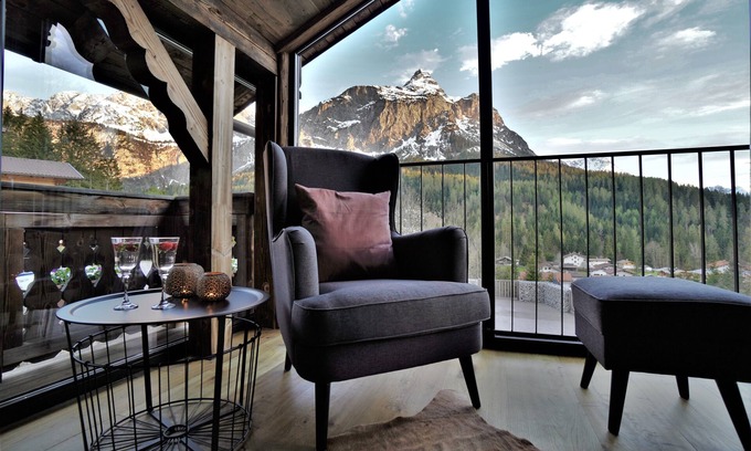 Ehrwald Ski Chalet | The Hof Chalet on the Zugspitze with mountain views, private garden, hot tub, sauna.