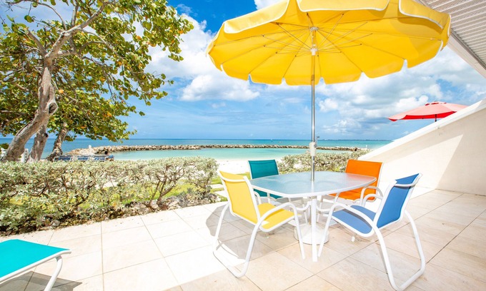 Seven Mile Beach Condo | The location & view speaks for itself ~ Oceanfront unit right on 7 M Beach!