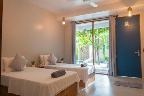 Rasdhoo Bed & Breakfast | The Palm Ray Rasdhoo