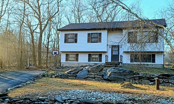 Pocono Mountain Lake House | The Pocono's Retreat with a Gameroom, Firepit, and Lake