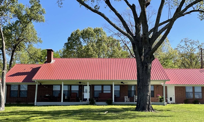 Eustace House | The Porch on Cedar Creek - gated & secluded 10 acre lake front escape
