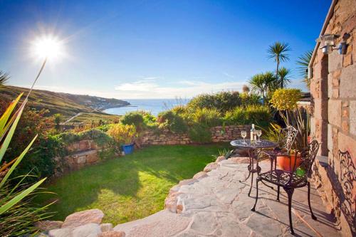 Sennen Cove House | The Studio Cottage, with, Sea views, Garden, Amazing Location by beach