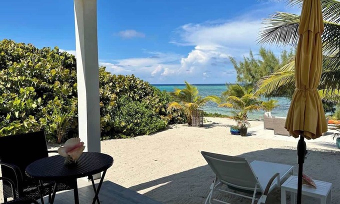 Colliers Bay Condo | The Tropical Breeze Oceanfront Studio Cottage in East End
