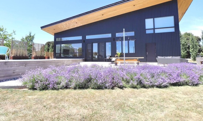 Merlin House | The Wave House | Waterfront, Pool, Sauna