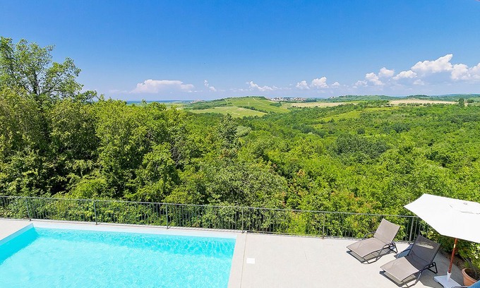 Baredine Villa | This 4-bedroom villa for up to 8 guests is located in Buje and has a private swimming pool, air-cond