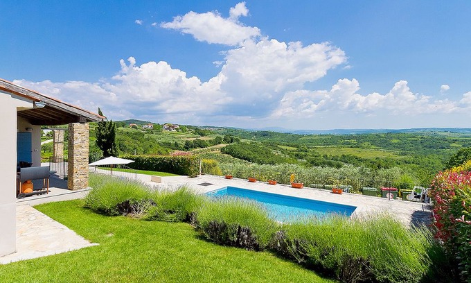 Baredine Villa | This 4-bedroom villa for up to 8 guests is located in Buje and has a private swimming pool, air-cond