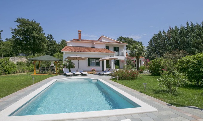 Rogocana Villa | This 4-bedroom villa for up to 9 guests is located in Labin and has a private swimming pool, air-con