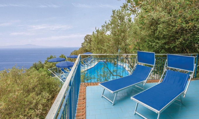 Monte Chiaro Apartment | This modern bungalow belongs to a vacation home complex directly above the sea, with a unique panora