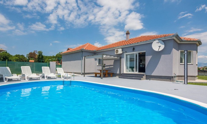 Policnik House | This spacious vacation home with pool is suitable for families or friends who want to enjoy nature,