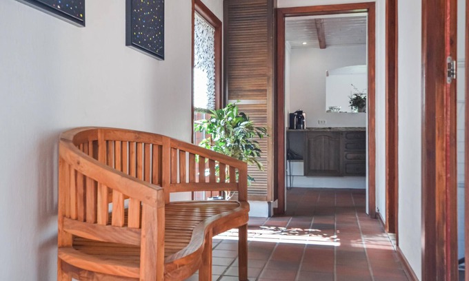 Varde House | This vacation home is located directly in the forest, yet close to the town of Varde.
