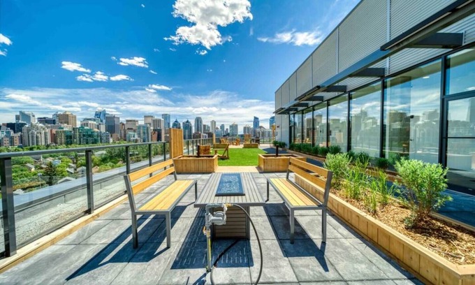 Sunnyside Condo | Three Condos on the same floor w Parking & Rooftop Patio