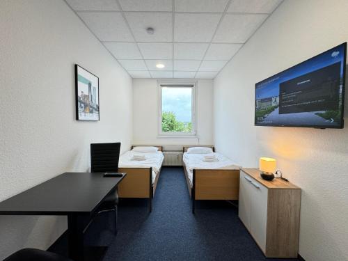 Neureut Apartment | Thuja Apartments Karlsruhe-Neureut by KurzZeit