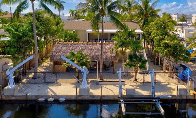 Sexton Cove Estates House | Tiki Time- Canal home with Boat Lift, Key Largo
