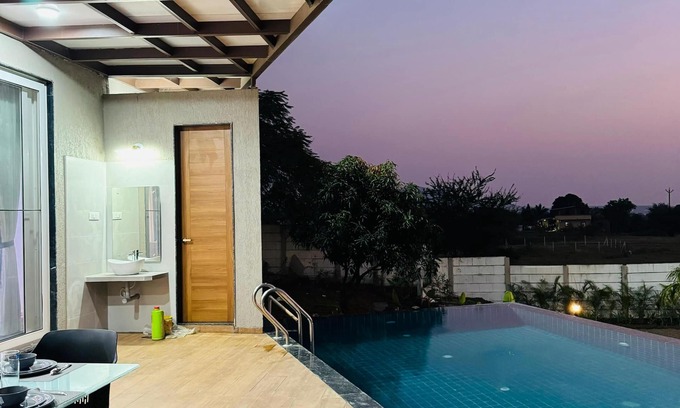 Nashik Villa | Tikona Villa 4BHK Luxury Villa in Pimplad Nashik with WiFi, AC, Swimming Pool