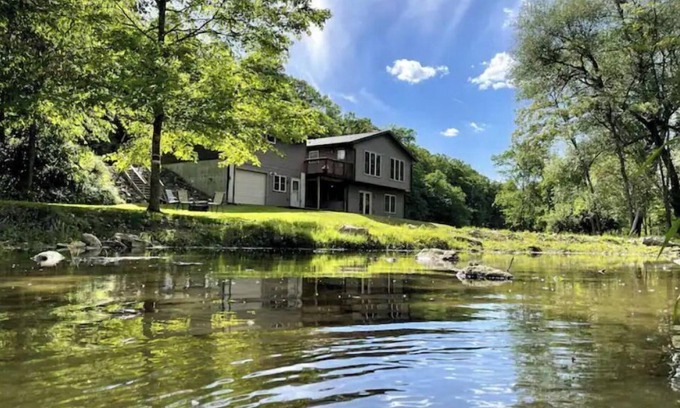 Westby House | Timber Coulee Creek in backyard, king size bed, grill on deck, large garage.