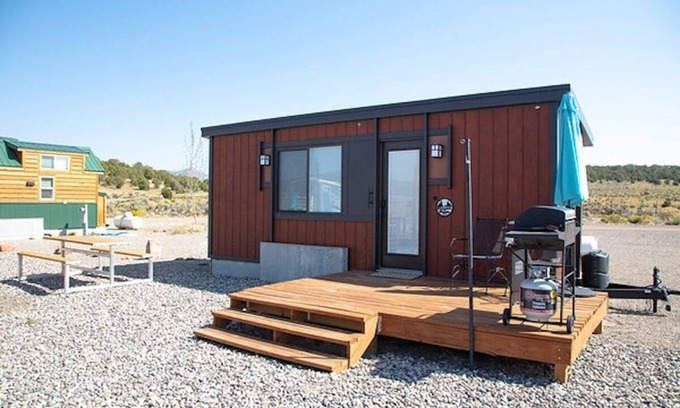 Meeker House | Tiny home with one queen bed and fold out couch all on main floor. Sleeps: 3