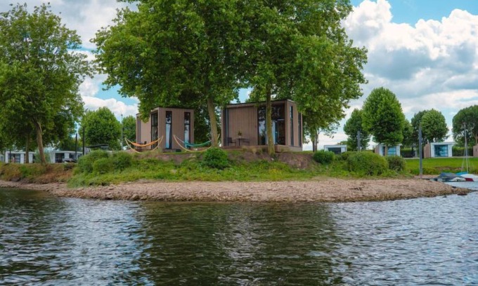 Maurik House | Tiny River House by Interhome