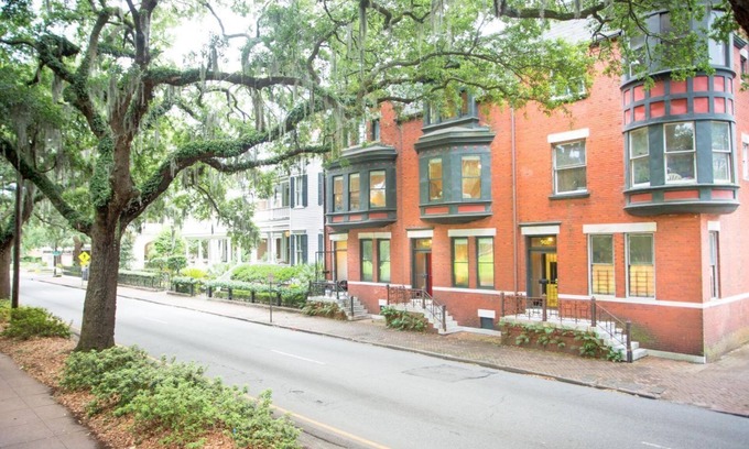 Savannah Victorian District House | Top Floor Row Home Looking Out Over Forsyth Park by Lucky Savannah