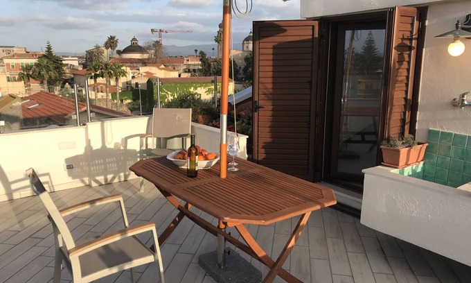 Oristano Apartment | Top floor small loft overlooking the old town near to the beach
