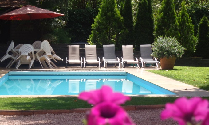 Galapagar House | Torrelodones: House with shared garden and pool 25 min from Madrid. Wifi