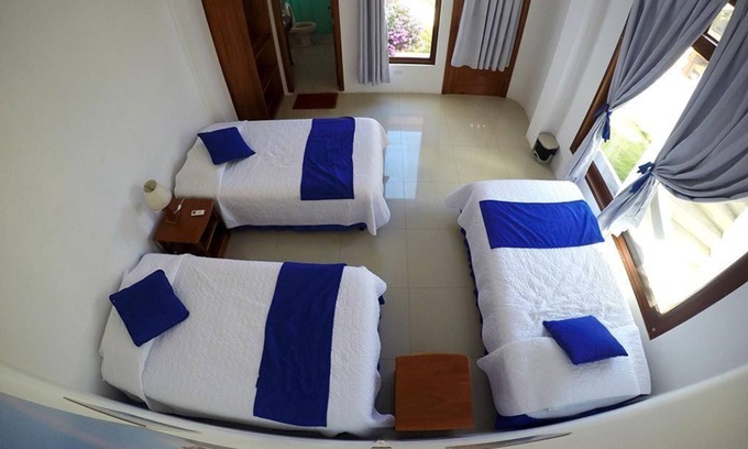 Puerto Villamil House | Tour to volcan, swim with sharks! Tripple Room Suite #3