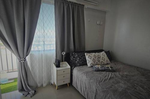 Santo Cristo Apartment | Tower 5-2722, K3 Staycation at Grass Residences