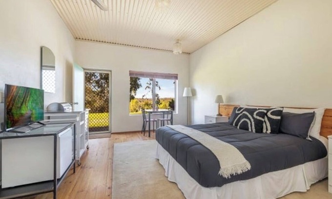 Armagh House | Tranquil motel style large room.