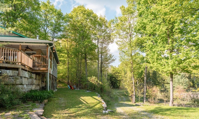 Bobcaygeon Ski Chalet | Tranquil Oasis in Trent Lakes w/Private Ponds, Fire Pit, Game Room & Hot Tub
