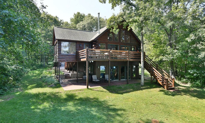 Trego House | Trego Lake House- Level elevation to the water's edge.