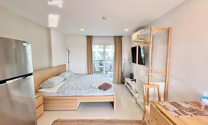 Kram Condo | Tropical beach nearby, Studio well-equiped kichen, AC, Wi-fi, Pools and Gym