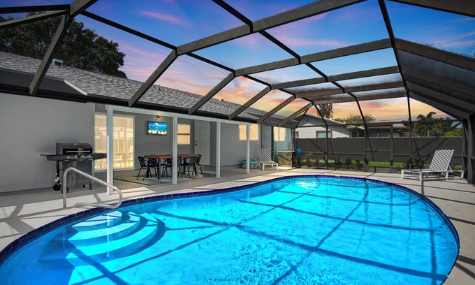 Port Saint Lucie House | Tropical Family Escape with Pool, Arcade Games and Outdoor Lounge