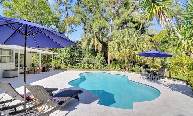 Jupiter Farms House | Tropical Paradise in Jupiter Farms with Heated Pool and bocce court, sleeps 7