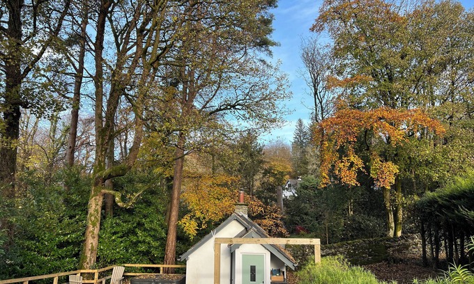 Windermere Cottage | Turn up. Switch off Surrounded by trees with stream nearby, perfect escape for 2