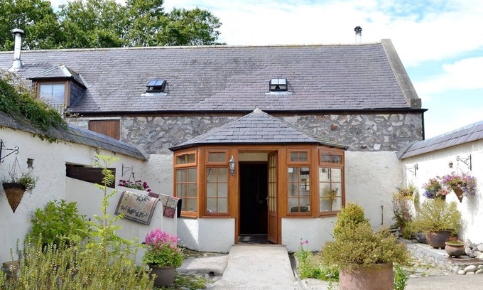 Aberchirder Cottage | Two Bedroom large family cottage, sleeps up to seven,and has outdoor dining.