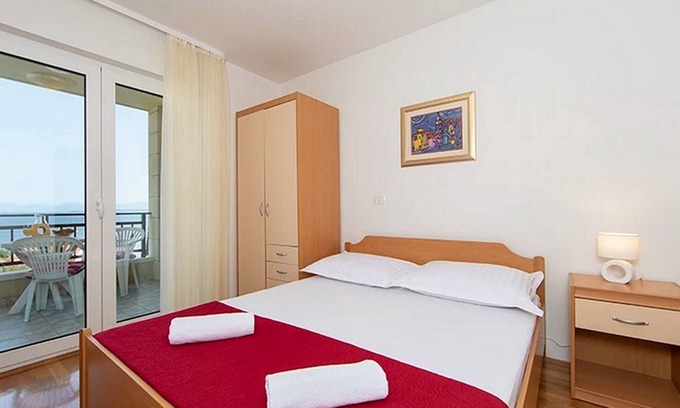 Igrane Apartment | Two bedroom apartment with terrace and sea view Igrane, Makarska (A-17292-a)