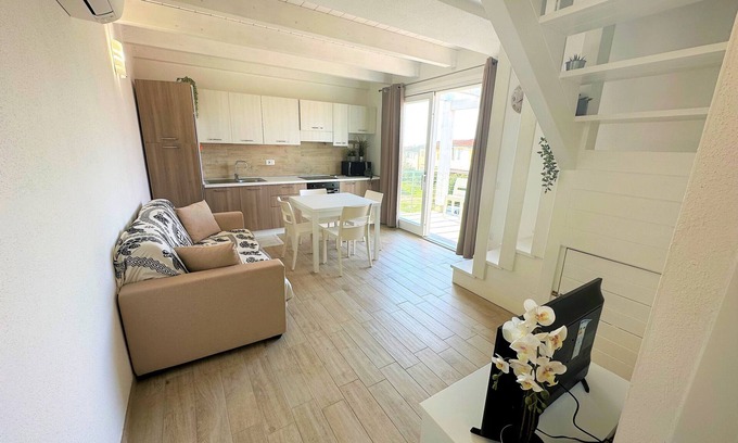 Trinita d'Agultu e Vignola Apartment | Two-story three-room apartment within walking distance of the sea, in a serviced area, with two balconies