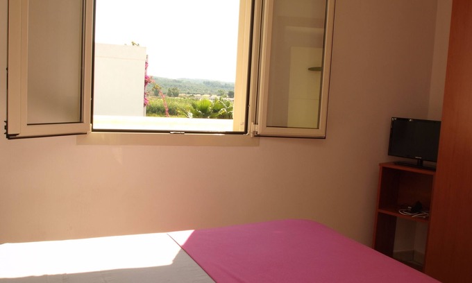 Torre Mozza Apartment | Two-room attic apartment with a view only 100 meters from Torre Mozza beach