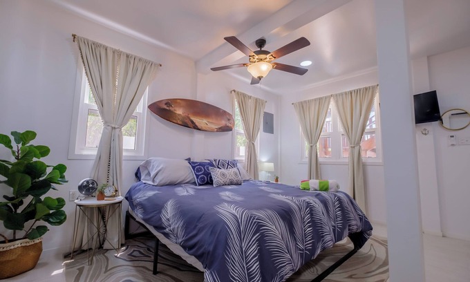 Caye Caulker Apartment | Two story house with king size bed in beautiful Caye Caulker