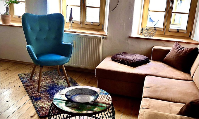 Altstadt Apartment | under a historical exposed wooden beam ceiling, monument protection