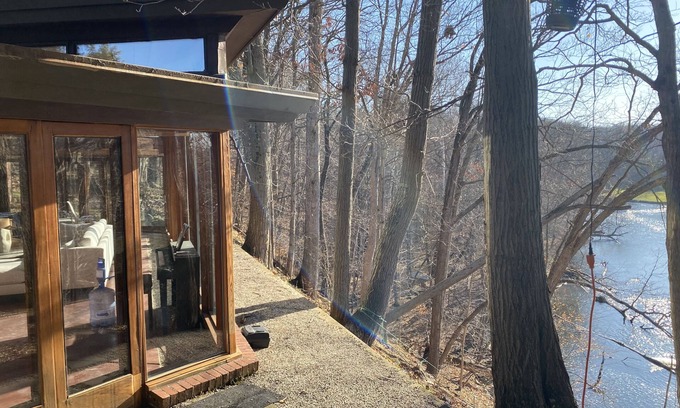 Alto Ski Chalet | Usonian Frank Lloyd Wright Inspired River House on the Thornapple River