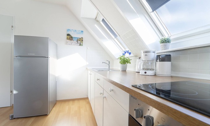 Groemitz Apartment | Vacation apartment Dachperle with balcony at Schützenstraße 31 in Grömitz